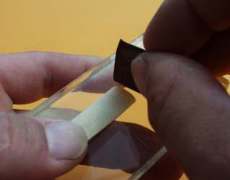 a clarinet reed tip which is too thick can be sanded
at first 2 mm to achieve an improvement of its response image: clarinet reed, tip sharpening